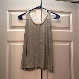 Comfortable grey, knit shirt from Francesca’s. Grey for warm weather.